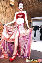 Long legs in high heels crop top in sarong