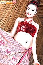 Hannah Lee in scarlet cropped top in sarong