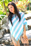 Jasmine Wang Wearing Striped Poncho