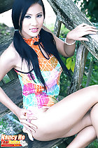 Seated on staircase long hair in pigtails