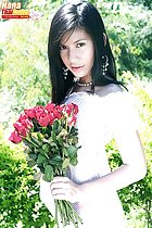 Holding red roses