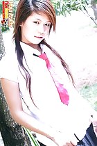 Pulling white shirt taut wearing tie