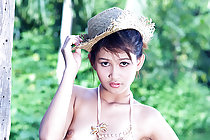 Tar Chang strips in hat and reveals her pert breasts