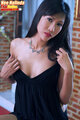 Nee nalinda slipping black dress from her shoulders wearing necklace