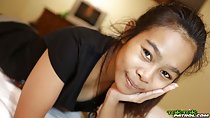 Lying on bed wearing black tshirt